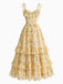 Gelbes 50er Kleid mit Blumen und Rüschen