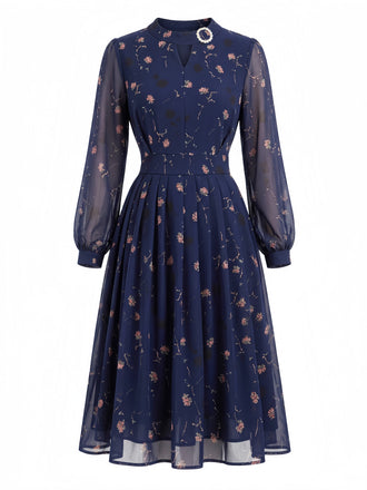 Blaues 40er Plisséekleid mit Streublumen und Langarm