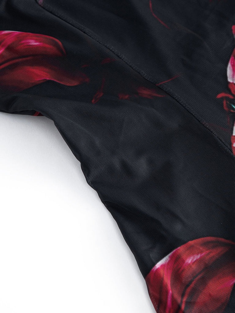 Schwarzes 40er Netzkleid mit roten Lilien und Rüschen