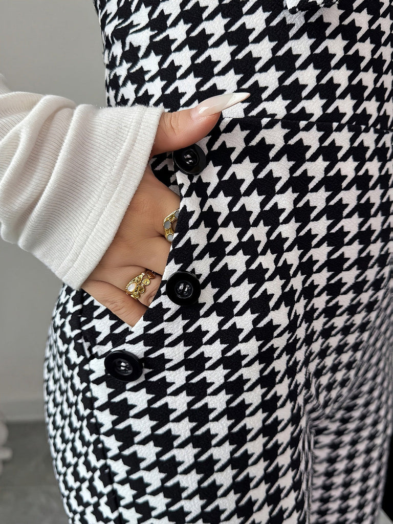 Schwarz-weißer 60er Overall-Jumpsuit mit Hahnentritt und Schlagbein