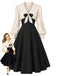 Creme-schwarzes 50er Kleid mit Schleife und Ballonärmeln