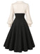 Creme-schwarzes 50er Kleid mit Schleife und Ballonärmeln