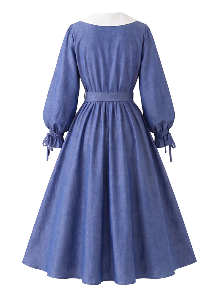 Blaues 50er Kleid mit Peter-Pan-Kragen und Rüschen