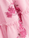 Rosa 50er Tutu-Kleid mit Streublumen und Korsett
