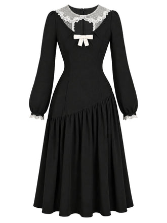 Schwarzes 50er Kleid mit transparentem Spitzenkragen und Schleife