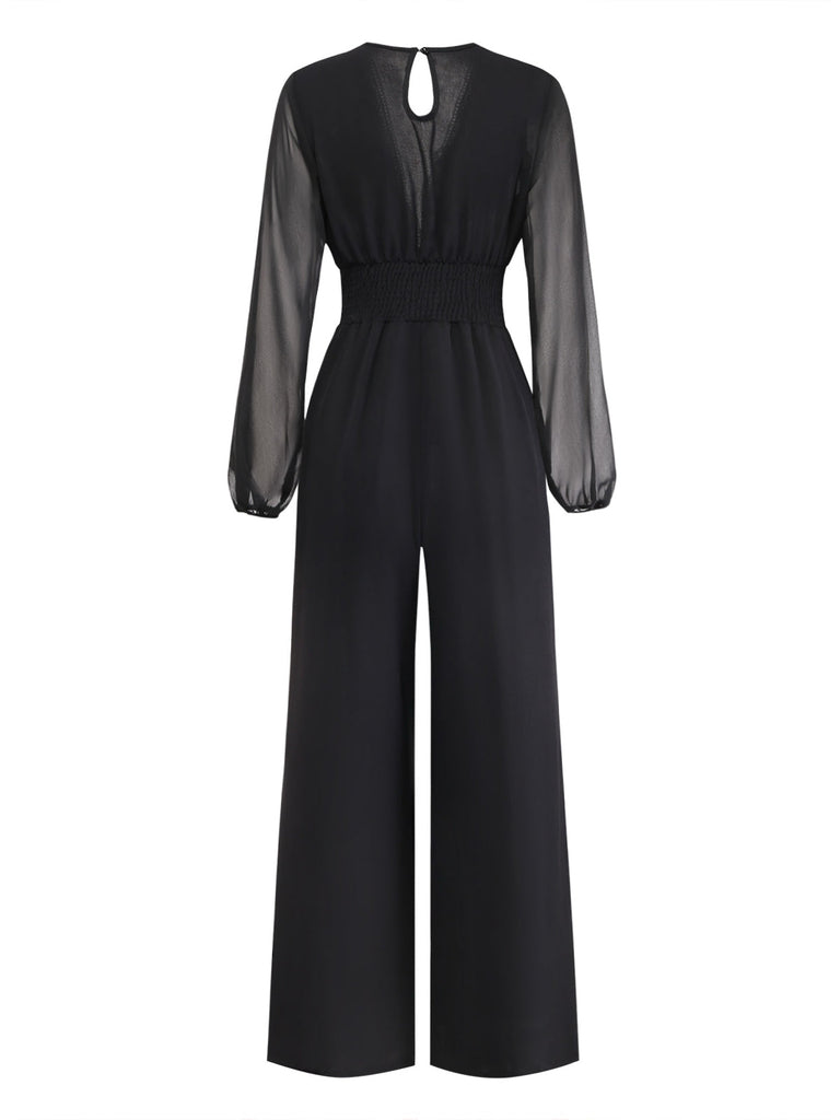 Schwarzer 30er Jumpsuit mit transparenten Ballonärmeln und Schlitz
