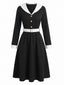 Schwarzes & Weißes 50er Kleid mit Revers und V-Ausschnitt