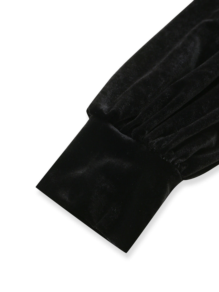 Schwarzes 60er Kleid mit Schulterschleife und betonter Taille