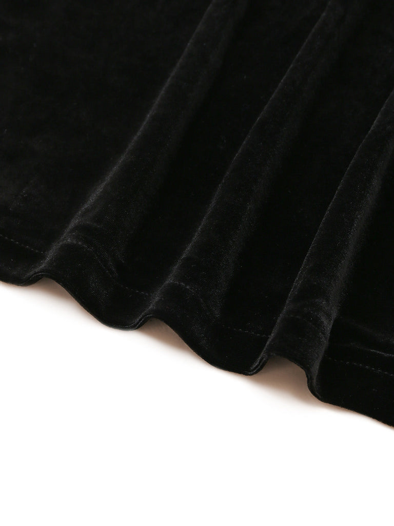 Schwarzes 60er Kleid mit Schulterschleife und betonter Taille