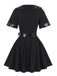 Schwarzes 50er Polizei-Kostümset mit Kleid, Mütze und Handschellen