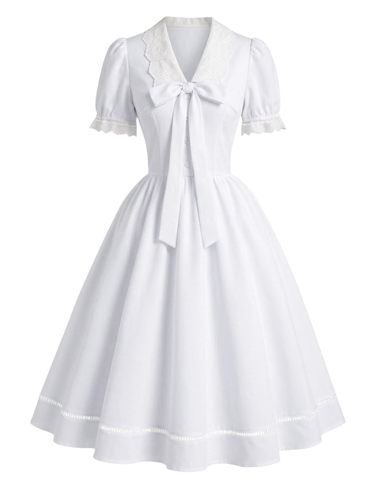 Weißes 50er Kleid mit Spitzen-Chelsea-Kragen und Schleife