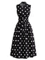 Schwarzes 50er ärmelloses Polka-Dot-Kleid mit V-Ausschnitt und Schleifengürtel