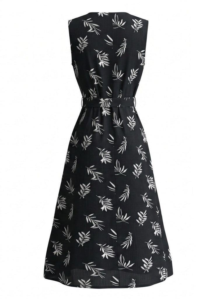 Tiefblaues 50er Kleid mit Blatt-Print und Gürtel
