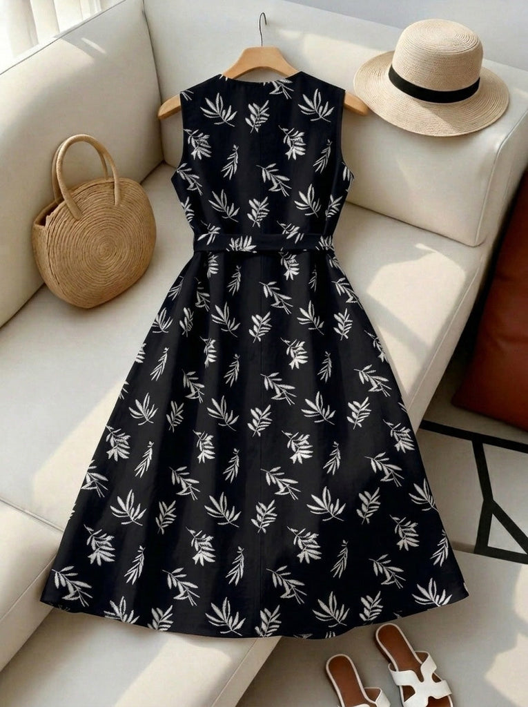 Tiefblaues 50er Kleid mit Blatt-Print und Gürtel