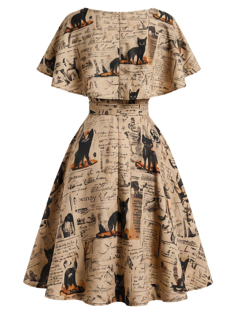 [Vorverkauf] 50er Capeletkleid mit Katzen-Zeitungsprint und Gürtel