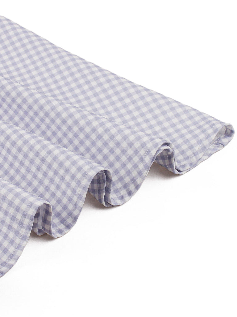 Tailliertes lavendelfarbenes 50er Ginghamkleid mit Spitze und Taschen