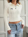 Weißer 50er Zopfstrick-Polopullover mit Schleifenstickerei