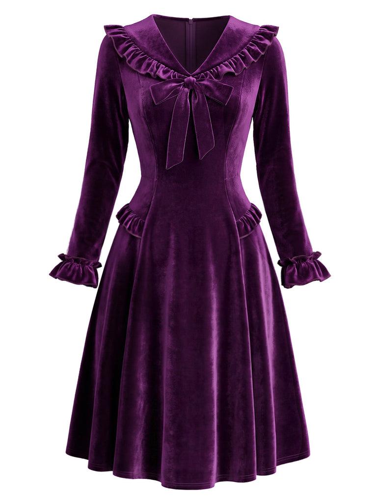 Lila 50er Langarm-Samtkleid mit gerüschtem V-Ausschnitt und Schleife