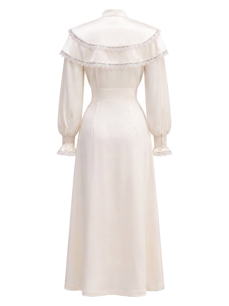 Beige 70er Kleid mit Cape-Effekt und Ballonärmeln