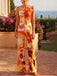 Orange 60er ärmelloser Blumen-Jumpsuit mit Herz-Cut-out am Rücken