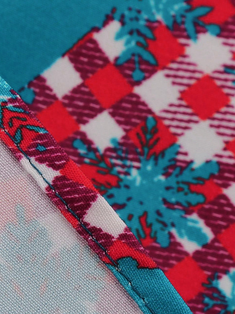 Blaues 50er Weihnachts-Swingkleid mit Strumpf-Print und Wellenausschnitt