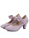Pumps mit Schleife und Blockabsatz