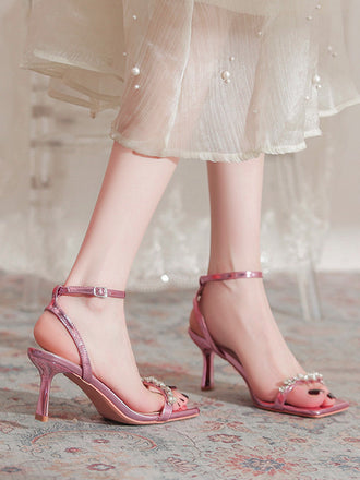 Rosa Sandalen mit Kristall und Riemen