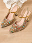 Goldene Stiletto-Pumps mit Glitzer und bunter Strass-Schnalle