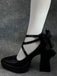 Schwarze spitze Mary-Jane-Schuhe mit gekreuzten Knöchelriemen