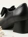 Schwarze Vintage Mary-Jane-Pumps mit Schleife und Blockabsatz
