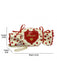 Rote Umhängetasche in Bonbonform mit Herzmotiv und Polka-Dots