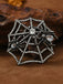 Brosche mit Strass und Spinnennetz