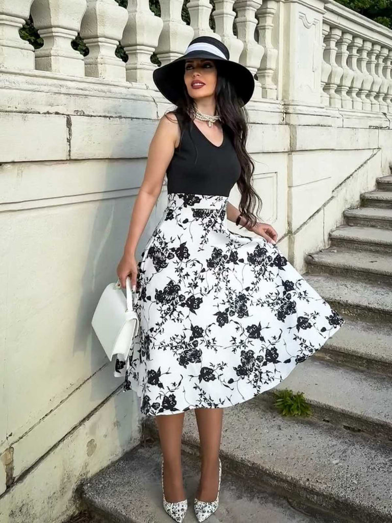 Schwarz 1950er Blumen Swing Kleid