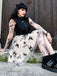 50er Kleid mit Schmetterlings und Patchwork in Schwarz