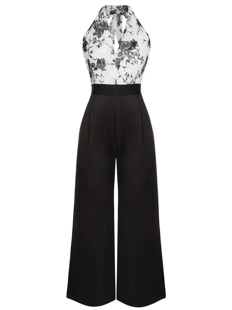 SCHWARZER WEISSER BLUMEN JUMPSUIT MIT HALFTERRIEMEN