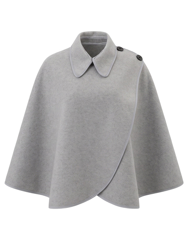 70er Cape mit asymmetrischer Schulterknopfleiste
