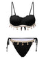 Schwarzes 50er Bikini-Set mit Muscheln und Seestern