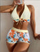 Hellgelbes 50er Bikini-Set mit Blätter-Print und Neckholder