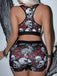 Schwarzes 80er Halloween-Sportset mit Totenkopf- und Rosenprint