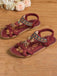 Flache Sandalen im Boho-Stil mit Perlenstickerei in Schmetterlings- und Herzform sowie Strassverzierungen – perfekt für gemütliche Sommerspaziergänge oder elegante Strandoutfits.
