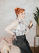 SCHWARZER WEISSER BLUMEN JUMPSUIT MIT HALFTERRIEMEN