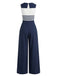 Marineblauer und weißer Jumpsuit mit gestreiftem Oberteil auf weißem Hintergrund