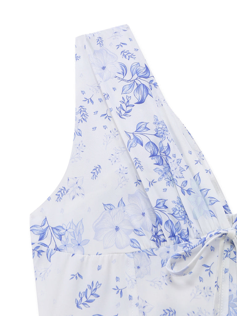 Blaues, ärmelloses Midikleid mit Blumenmuster im Stil der 1950er Jahre mit tiefem V-Ausschnitt und Korsett-Design (Nahaufnahme)