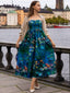 Blaues 50er trägerloses Kleid mit Seerosen