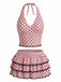 Pinkfarbenes Tankini-Top mit Polka-Dots und Rüschen-Schwimmrock im Vintage-Stil der 1950er Jahre, perfekt zum Schwimmen am Strand und für sommerliche Aktivitäten am Pool.
