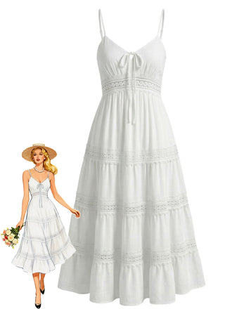 Ein weißes, ärmelloses Midikleid mit Stufenrock, Lochspitzeneinsätzen und einem vorne gebundenen herzförmigen Ausschnitt.