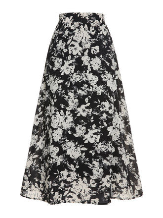 Schwarz-weißer 1960er Rock mit Blumendruck in A-Linie