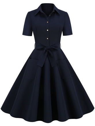 MARINEBLAUES SWING-KLEID MIT EINFARBIGEM GÜRTEL